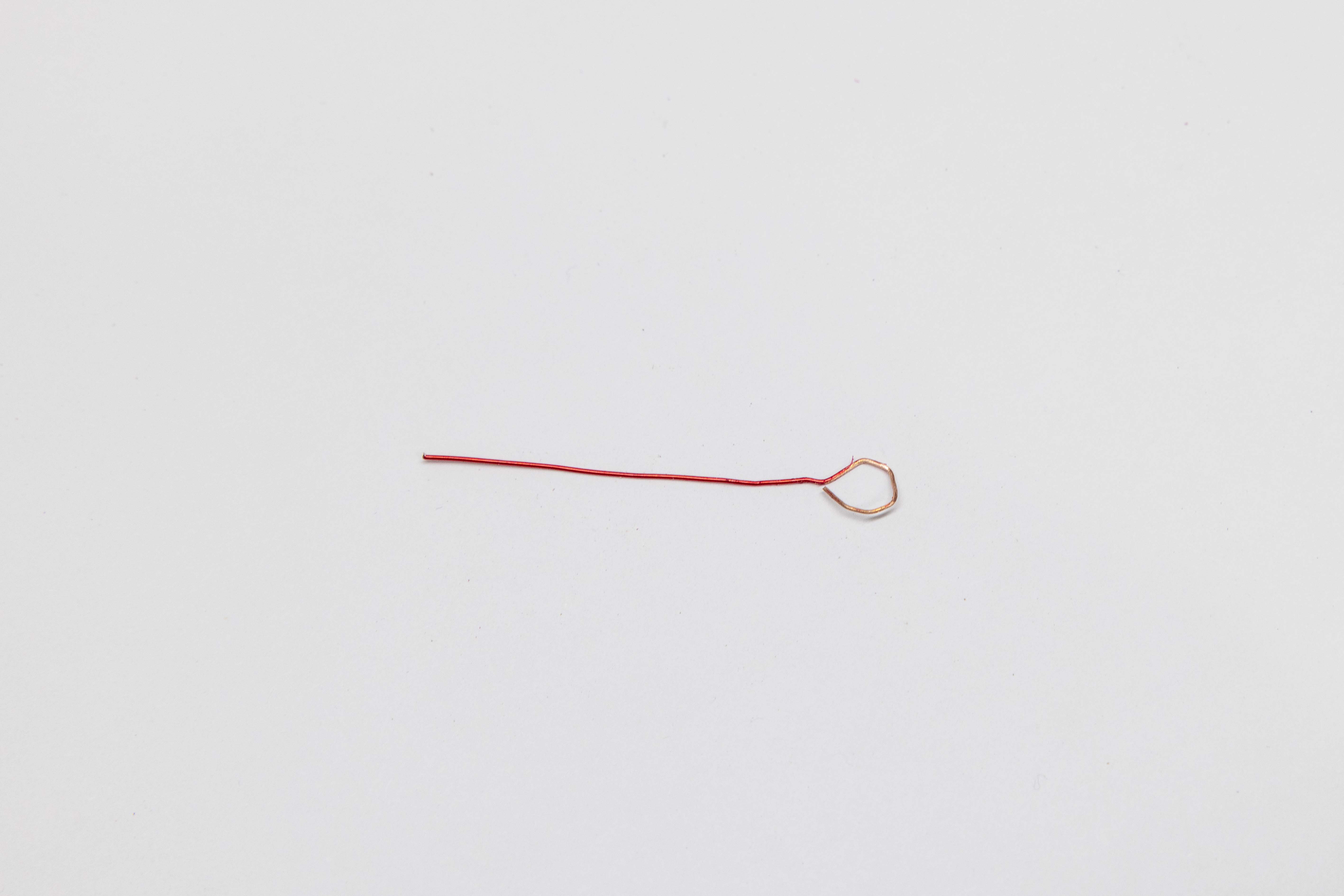 Wire loop formed and laid in key body cavity