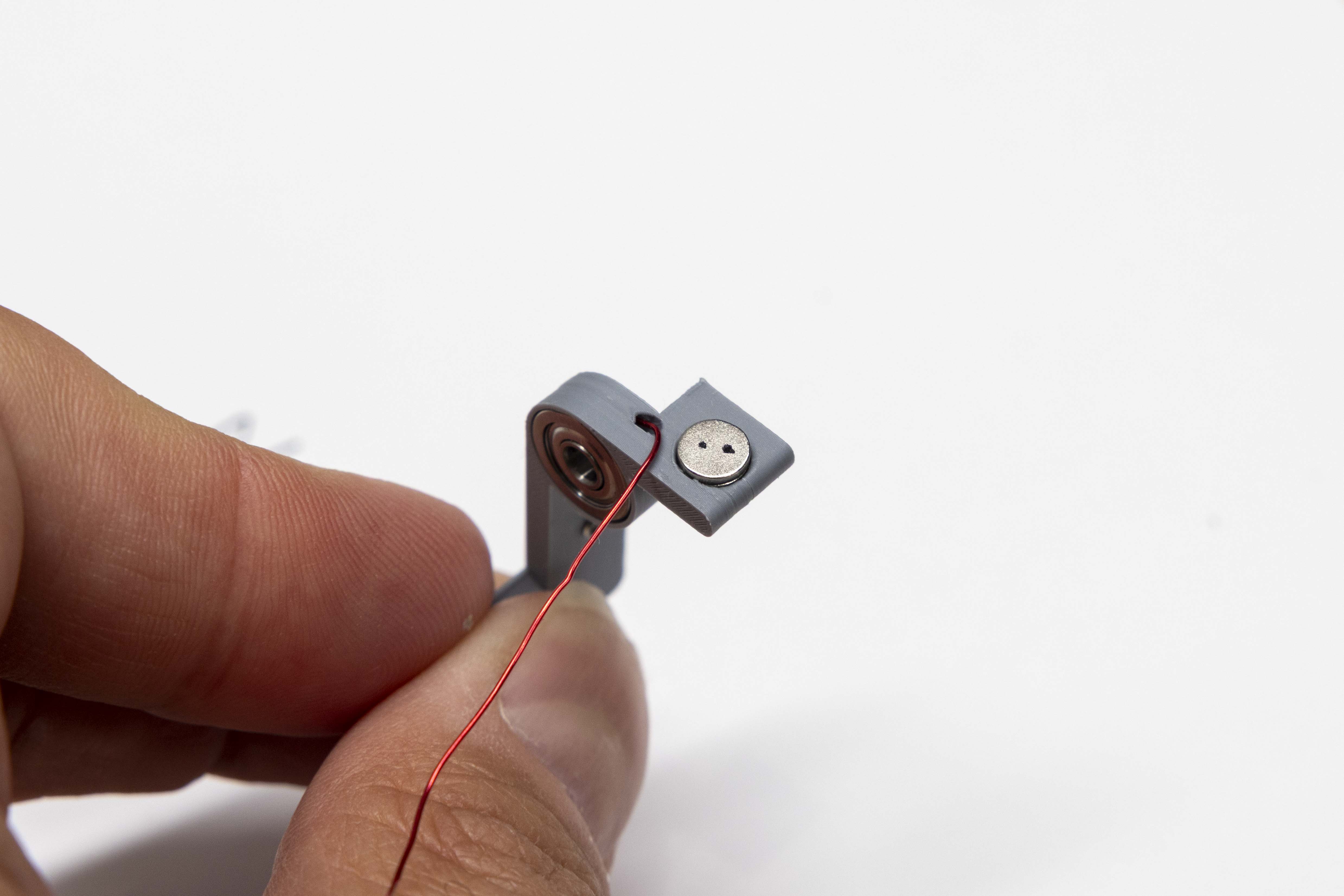 Both body magnets installed in key body with dotted faces outward