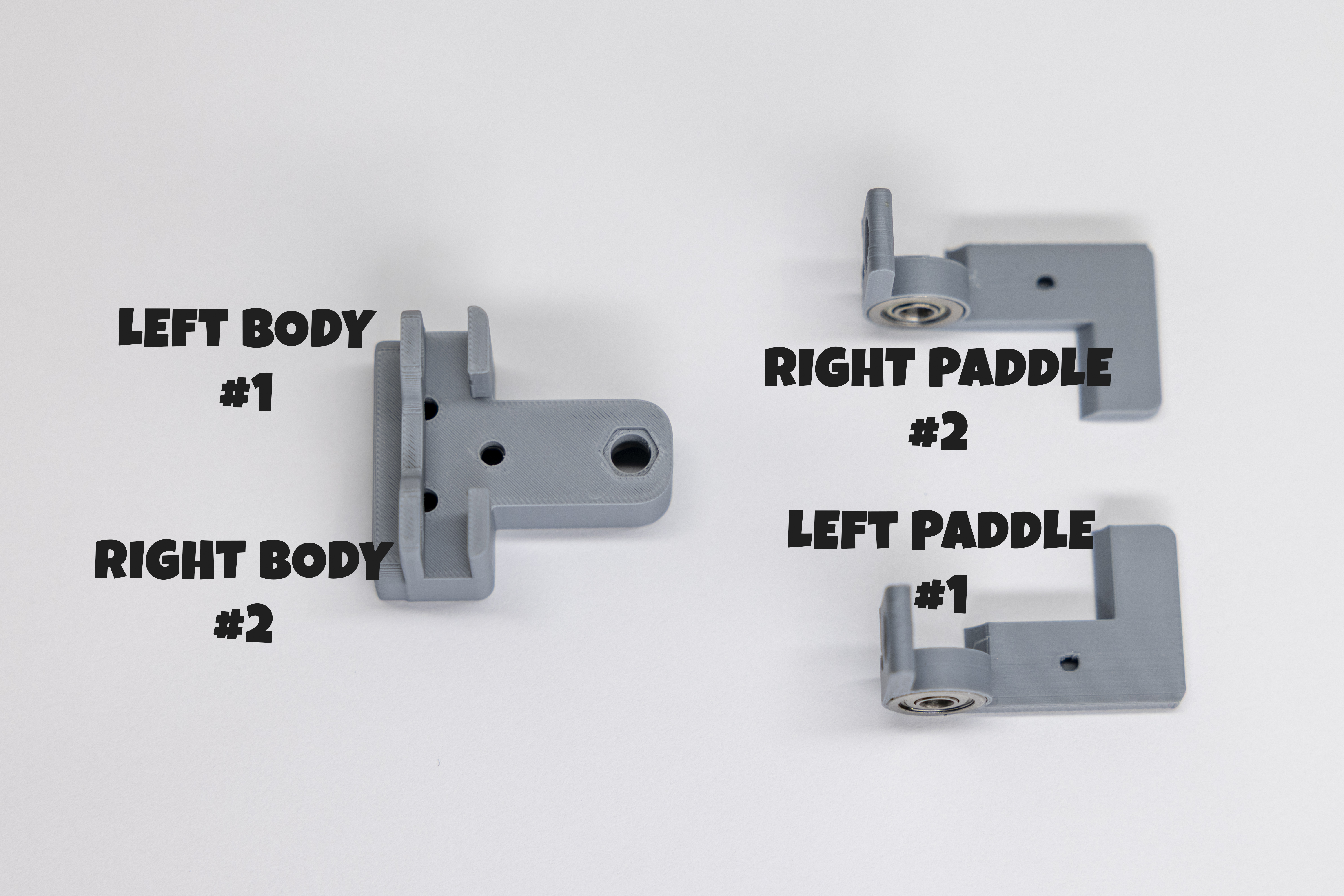 Paddles positioned next to the key body showing opposite-side body magnet holes
